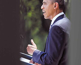 President Barack Obama speaks in Rose Garden of the White House in Washington, Tuesday, Aug. 2, 2011, after the Senate passed the debt ceiling legislation. (AP Photo/Carolyn Kaster)