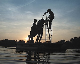 Allie Vugrincic of John F. Kennedy High School sent in this photo she took at Sandy Lake of John Nader of JFK, left, Julia Bentz of Ursline High School and Ellie Cole of JFK.