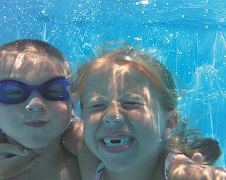 Cousins can make the best friends! Here Dante Gentile, 4, and Alissa Hephner, 6, both of New Middletown, mug for the camera underwater while visiting the Outer Banks in North Carolina. Photo sent in by Kristy Gentile.