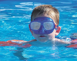 Landon Malmfeldt, 4, enjoys some pool time in Youngstown.