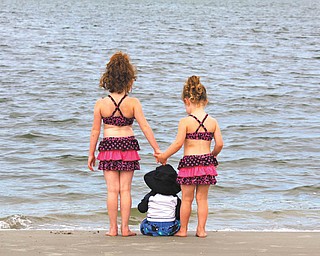 Sydney, 6, Connor, 11 months, and Kennedy, 3, enjoy the ocean on Hilton Head Island. Their parents are Todd and Jacey Henderson of Poland, who sent in the photo.