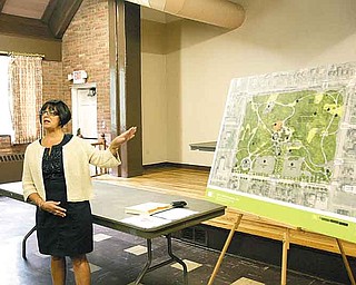 Sharon Letson, executive director of Youngstown CityScape, shows redevelopment plans for the historic park.