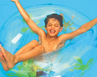Stephen Pacheco, son of Stephen and Raquel Pacheco, all of Canfield, has a good time while at his grandparents' pool. Photo taken by Grandma Aida Pacheco of Campbell.
