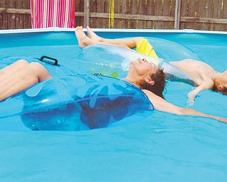 Grandma Aida Pacheco of Campbell submitted this photo of her and her grandson, Stephen Pacheco, son of Stephen and Racquel Pacheco of Canfield, cooling off in her pool.