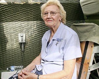 JESSICA M. KANALAS | THE VINDICATOR..Dixie Kosovec rides in the plane for the first time. ..-30-