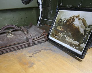 JESSICA M. KANALAS | THE VINDICATOR..Photos and artifacts could be found inside the plane...-30-