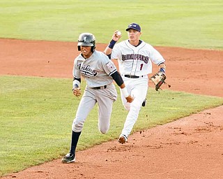 SCRAPPERS - (1) Tony Wolters tries to run down Mason Williams Thursday night in Niles. - Special to The Vindicator/Nick Mays