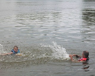 Ryan Lamb, 6, and his Uncle Mark David of Cleveland, Ohio, are at Lake Roaming Rock, Roaming Shores, Ohio. Ryan's parents are Bruce and DeAnne Lamb of Canfield.