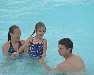 Pictured are Eden Lesnansky, 7, of Boardman, Alana Lesnansky, 17, of Boardman, and her boyfriend, Jimmy Tancabel, 17, of Boardman. Photo was submitted by the girlsÕ father, George P. Lesnansky, Jr. of Youngstown.