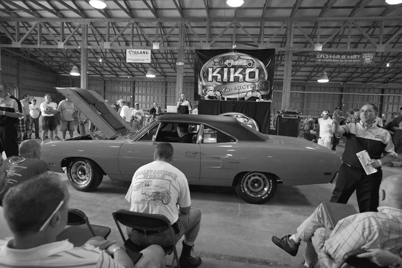 Going, going, gone: KIKO Classic Car Auctioneers auctioned off classic vehicles 26 years or older to several hundred bidders at Canfield Fairgrounds recently during Dave & Ed’s Summer Auto Event. The auction began with memorabilia such as oil cans, signs, oilers and a Sinclair gas pump that sold for $1,980. Highlights of the vehicle sales included a 1970 Plymouth Roadrunner, a 1969 Chevrolet Camaro and a 1924 T-Bucket. The next auction will be Sept. 10 in Sandusky.