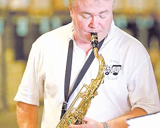 Jeff Bodkin and his band provided music at a picnic by Second Harvest Food Bank of the Mahoning Valley to honor its volunteers. Bodkin, who also volunteers at the food bank, performed Saturday.