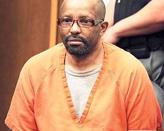 Anthony Sowell sits in the courtroom before the jury recommended the death penalty for Sowell Wednesday, August 10, 2011 in Cleveland. Sowell was convicted July 22 of aggravated murder in 11 women's deaths. (AP Photo/The Plain Dealer, Marvin Fong, Pool)