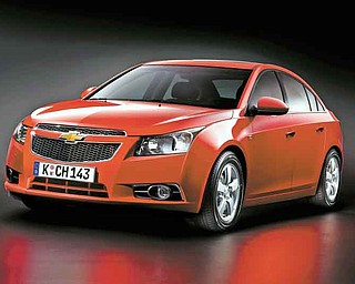 This undated photo provided by General Motors shows a 2011 Chevrolet Cruze. (AP Photo/General Motors)