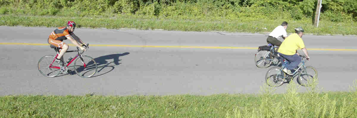 ROBERT K. YOSAY | THE VINDICATOR...Powers way  shadows - .Ride to work with Franko...Frank Krygowski-- White shirt -- Carl Frost - Orange and Black - Todd Franko in Orange -30-