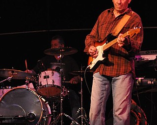 The Sante Fe Band, a local country cover band, opens for Sarah Turner at Gossip in Austintown.