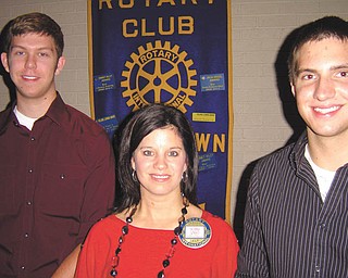 Scholarship recipients: Austintown Fitch High School seniors Alex Sofranko, left, and Jason Miller, right, received scholarships from Rotary Club of Austintown at the club’s Aug. 8 meeting. Both students were involved in Rotary’s Interact Club at the school. Alex plans to study chemistry at Ohio State University, and Jason is planning to be a registered nurse and will attend Youngstown State University in the fall.