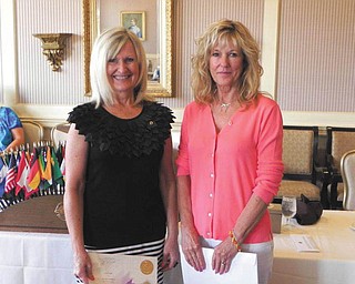 Induction ceremony: During Youngstown Lions Club’s recent induction ceremony, member Nancy Cuffle of Poland, left, presented the club’s newest member, whom she sponsored, Pat Nichols of Liberty. The club is always looking for new members and will be inducting two more soon. Meetings are at noon every Thursday at the Youngstown Club. For more information, visit www.youngstownlionsclub.org, write to the club at PO Box 1262, Youngstown 44501, or check it out on Facebook.