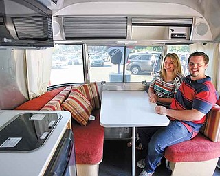 Jessica Clifford of Niles and her fiance, Corey Diles of Braceville, are seen in Clifford's new Airstream Trailer. She won it in a contest sponsored by Little Debbie Foods.