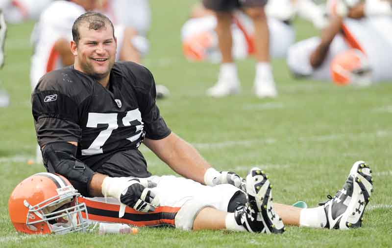 Cleveland Browns' offensive tackle, Joe Thomas, stretches during practice at the NFL football team's training camp Tuesday, Aug. 2, 2011, in Berea, Ohio. (AP Photo/Tony Dejak)