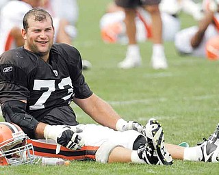Cleveland Browns' offensive tackle, Joe Thomas, stretches during practice at the NFL football team's training camp Tuesday, Aug. 2, 2011, in Berea, Ohio. (AP Photo/Tony Dejak)