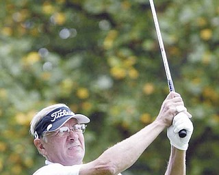 William d LEwis The Vindicator Bob Leonard winner of senior golf tourney tees off.