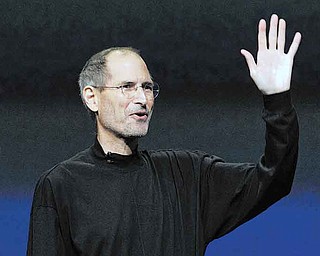 FILE - In this March 2, 2011 file photo, Apple Inc. Chairman and CEO Steve Jobs waves to his audience at an Apple event at the Yerba Buena Center for the Arts Theater in San Francisco. Apple Inc. on Wednesday, Aug. 24, 2011 said Jobs is resigning as CEO, effective immediately. (AP Photo/Jeff Chiu, File)