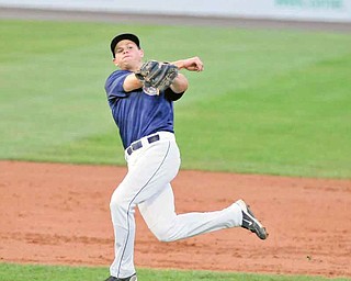 Mahoning Valley Scrappers second baseman Todd Hankins makes an off -balance throw to first base in the third inning of Wednesday’s game against the Auburn Doubledays at Eastwood Field. Hankins could not throw out Auburn’s Bryce Ortega, who was credited with an infield single.
