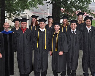 Professor Frank Boos, Ph D. and graduates of Exercise Science from the 2011 YSU Summer commencement....Photo By: Lindsay Y McCall | The Vindicator