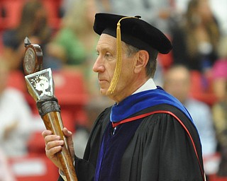 The University Ceremonial Mace leads the professors and students as they enter the Beeghly Center at the 2011YSU Summer commencement....Photo By: Lindsay Y McCall | The Vindicator