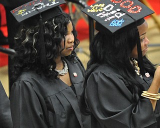 Graduates from the 2011 YSU ceremony held at the Beeghly Center showcase their unique hats...Photo By: Lindsay Y McCall | The Vindicator