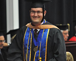 Student commencement speaker Kolton Ross Codner receives his Master of Business Administration at the 2011 YSU summer commencement...Photo By: Lindsay Y McCall | The Vindicator