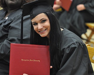 Brittney Zemko poses with her degree from the 2011 YSU summer commencement..Photo by: Lindsay Y McCall | The Vindicator