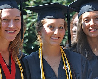 Kayla Renee Witmer posing with her friends after graduating from the Bitonte College of Health and Human Services at YSU..Photo By: Lindsay Y McCall | The Vindicator