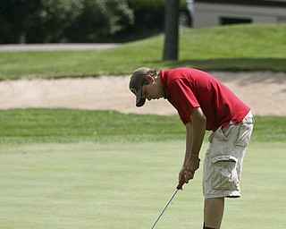 JESSICA M. KANALAS | THE VINDICATOR..Greg Cook putts during day two of the Greatest Golfer Tournament at Youngstown Country Club... -30-