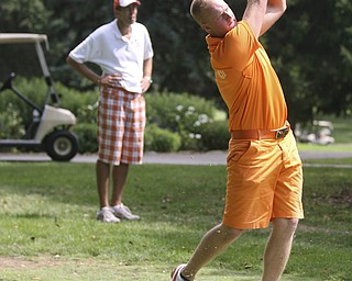 JESSICA M. KANALAS | THE VINDICATOR..Brian Stauffer tees off during day two of the Greatest Golfer Tournament at Youngstown Country Club... -30-