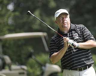 JESSICA M. KANALAS | THE VINDICATOR..Rex Pagani watches for his ball after teeing off during day two of the Greatest Golfer Tournament at Youngstown Country Club... -30-