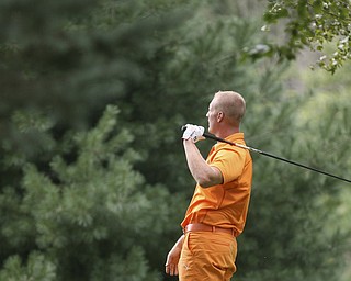 JESSICA M. KANALAS | THE VINDICATOR..Brian Stauffer watches his ball after teeing off during day two of the Greatest Golfer Tournament at Youngstown Country Club... -30-
