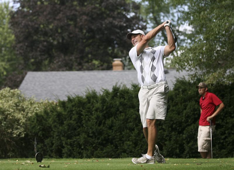 JESSICA M. KANALAS | THE VINDICATOR..Mike Portertees off during day two of the Greatest Golfer Tournament at Youngstown Country Club... -30-