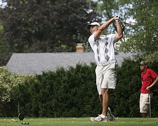 JESSICA M. KANALAS | THE VINDICATOR..Mike Portertees off during day two of the Greatest Golfer Tournament at Youngstown Country Club... -30-