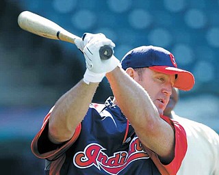 Cleveland Indians' Jim Thome  warms up during batting practice before a baseball game against the Kansas City Royals Friday, Aug. 26, 2011, in Cleveland. Nine years after leaving and losing some fans and credibility, Thome returns to the Indians, his team for 12 seasons and one that needs his big swing to help them get to the postseason. (AP Photo/Mark Duncan)