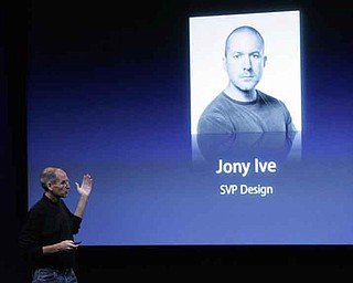 FILE - In this Oct. 14, 2008 file photo, Apple CEO Steve Jobs talks about Jonathan Ive, Apple senior vice president of Industrial Design, at a meeting in Cupertino, Calif. Jobs may be the company's most recognizable personality, but much of its cachet comes from its clean, friendly-looking designs _ the product of its head designer, Jonathan Ive. (AP Photo/Paul Sakuma, File)
