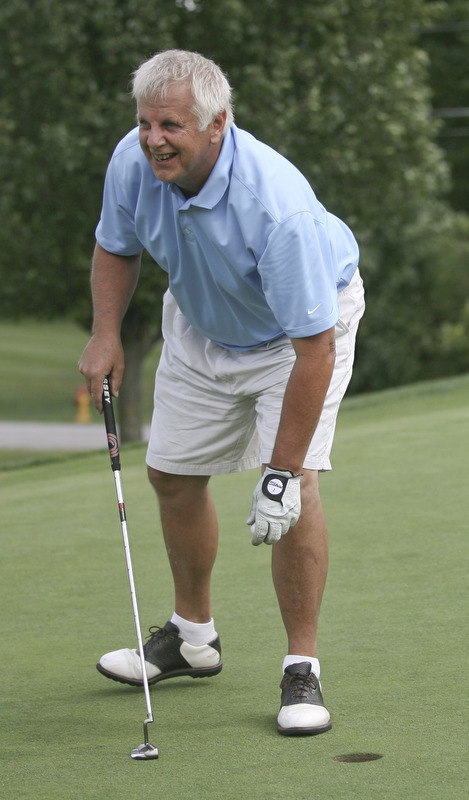 JESSICA M. KANALAS | THE VINDICATOR..Glenn Milton of Mill Creek Golf Course laughs with the other golfers after putting during the final day at the Greatest Golfer of the Valley tournament at The Lake Club.