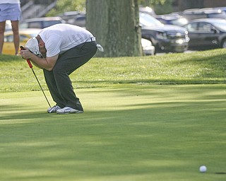 JESSICA M. KANALAS | THE VINDICATOR..Josh Zarlenga of Youngstown Country Club bends down in disappointment after barely missing his putt on the next-to-last hole during the final day at the Greatest Golfer of the Valley tournament at The Lake Club. The miss was a potential winner as he ended the day tied for the lead and lost in a one-hole playoff.