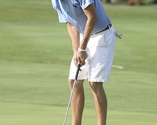 JESSICA M. KANALAS | THE VINDICATOR..Anthony Conn of Mill Creek Golf Course completes his final putt during the final day at the Greatest Golfer of the Valley tournament at The Lake Club, making him the 2011 Champion.