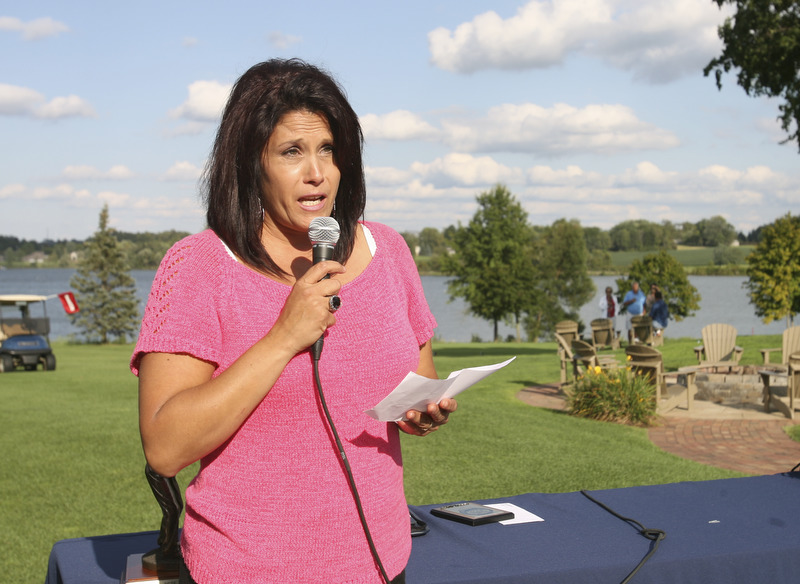 JESSICA M. KANALAS | THE VINDICATOR..Mary Beidelschies, daughter of the late Vindicator sports writer Pete Mollica, speaks during the award ceremony for the Greatest Golfer of the Valley tournament at The Lake Club.