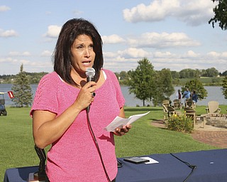 JESSICA M. KANALAS | THE VINDICATOR..Mary Beidelschies, daughter of the late Vindicator sports writer Pete Mollica, speaks during the award ceremony for the Greatest Golfer of the Valley tournament at The Lake Club.