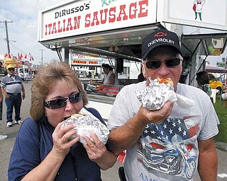 Larry and Debbie Jones of Newton Falls enjoy the original DiRusso hot sausage sandwich.
