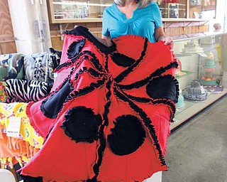 Susan Draghi of Liberty won a blue ribbon for her ladybug fleece blanket at the Canfield Fair. Draghi’s blanket, along with other entries, are a part of a fair contest called “The Fair That Cares.” The homemade blankets will be collected and sent to the Rescue Mission of the Mahoning Valley.