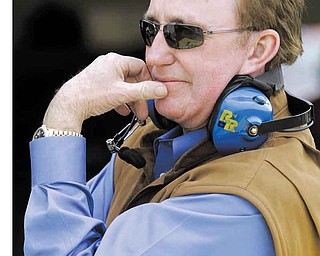 FILE - Int his Feb. 16, 2011, file photo, team owner Richard Childress looks on during practice for the NASCAR Daytona 500 auto race at Daytona International Speedway in Daytona Beach, Fla. Childress guaranteed one of his drivers would dethrone Jimmie Johnson this year. During the early part of this season, it seemed like Kevin Harvick could be the one to wrest the title from Johnson. Now he's in a slump, and, even worse, he could be the only RCR driver to even make the Chase for the Sprint Cup championship. (AP Photo/Terry Renna, File)