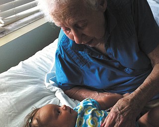 Mattie Tibolla, 3 months old, loves listening to the stories her 94-year-old great-grandma (Baba) Veronica Tabak tells her! Both are of Austintown. Photo submitted by Amy Tibolla, Mattie's mom.